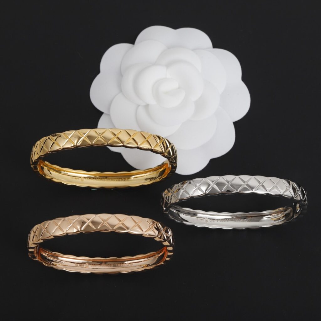 Gold minimalist jewelry collection featuring necklaces, earrings, rings, and bracelets designed for office wear, expressing quiet luxury and refined everyday elegance.